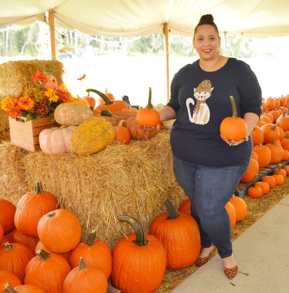 fashion blogger farrah estrella at a pumpkin patch in tampa 